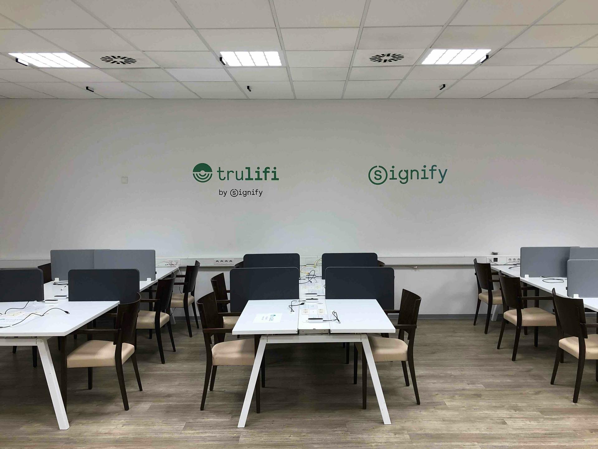 Reporters who sit under these lights in the press center at Hamburg&rsquo;s Volkspark Stadium can use them to send their stories via Li-Fi. (Photo credit: Image courtesy of Signify.)