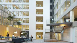 FIG. 1. The newly-built Edge building in Amsterdam is known for its IoT backbone and the ubiquitous deployment of Power over Ethernet as a backbone that enables advanced applications such as space optimization, but building retrofits need the flexibility of a wireless network and a standard intra-luminaire bus can enable flexible choices in inter-luminaire connectivity. (Photo credit: Image courtesy of Deloitte Group, photographer Ronald Tilleman; http://tilleman.nl.)