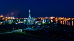 Refineries have to be well lit for safety reasons at night, so there’s no other way to mitigate circadian disruption than by minimizing the blue content, says Circadian Light CEO Dr. Martin Moore-Ede. (Photo credit: Image by David Mark from Pixabay.)