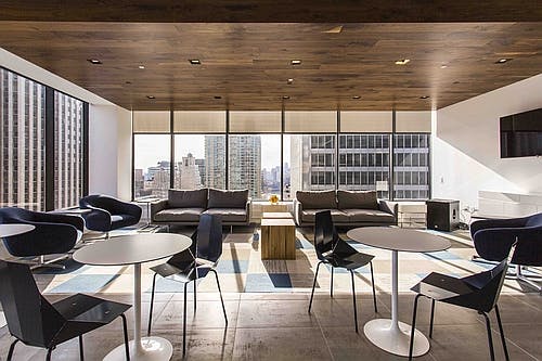 Organic Response's IoT technology might stay more independent if a non-lighting company acquires it. Above, the New York City offices of financial firm Dixon Advisory, lit by a combination of GE lighting and Organic Response sensors and controls.