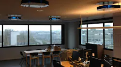 Upper air UV-C luminaires, such as these at Signify premises, are an education for potential commercial users, who want to know that they're safe, Signify CEO Eric Rondolat said. (Photo credit: Image courtesy of Signify.)