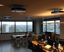 Upper air UV-C luminaires, such as these at Signify premises, are an education for potential commercial users, who want to know that they're safe, Signify CEO Eric Rondolat said. (Photo credit: Image courtesy of Signify.) Upper air UV-C luminaires, such as these at Signify premises, are an education for potential commercial users, who want to know that they're safe, Signify CEO Eric Rondolat said. (Photo credit: Image courtesy of Signify.)