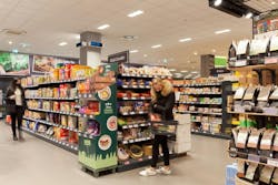 Grocery chain Edeka has placed 31 outward-pointing rectangular UV-C fixtures around a Hamburg store at a height of approximately 11 ft, such as the two on the pillar in the upper center of this photo. (Photo credits: All photos courtesy of Signify.) Grocery chain Edeka has placed 31 outward-pointing rectangular UV-C fixtures around a Hamburg store at a height of approximately 11 ft, such as the two on the pillar in the upper center of this photo. (Photo credits: All photos courtesy of Signify.)