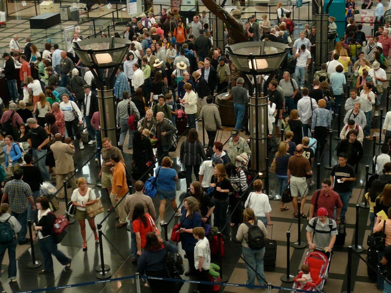 Airport security scrums could potentially get even longer with manual disinfection of trays. The LED Aviation system is intended to automate and speed up the process with UV-C. (Photo credit: Image by alist via Flickr at https://bit.ly/36sLwlZ; used under CC BY-NC 2.0 for non-commercial purpose only. License info: https://bit.ly/3nk0Qrt.)