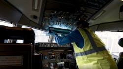 A worker in a United Airlines flight deck uses a handheld ultraviolet C-band (UV-C) device by American Ultraviolet to disinfect hard-to-clean control surfaces. The Cleveland Clinic consulted with the airline to evaluate the safety and efficacy of the process. (Photo credit: Screenshot from United Airlines B-roll video for media distribution.) A worker in a United Airlines flight deck uses a handheld ultraviolet C-band (UV-C) device by American Ultraviolet to disinfect hard-to-clean control surfaces. The Cleveland Clinic consulted with the airline to evaluate the safety and efficacy of the process. (Photo credit: Screenshot from United Airlines B-roll video for media distribution.)