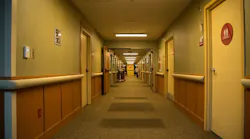 The Pacific Northwest National Laboratory (PNNL) has shared results of senior care-center study in which tunable solid-state lighting (SSL) was utilized in control and intervention scenarios. In this photo, nighttime corridor lighting was set at 2700K and dimmed to 20% output to gather data on its effect on residents’ sleeping and activity patterns. (Photo credit: Image courtesy of the Pacific Northwest National Laboratory/US Department of Energy Solid-State Lighting Program.)