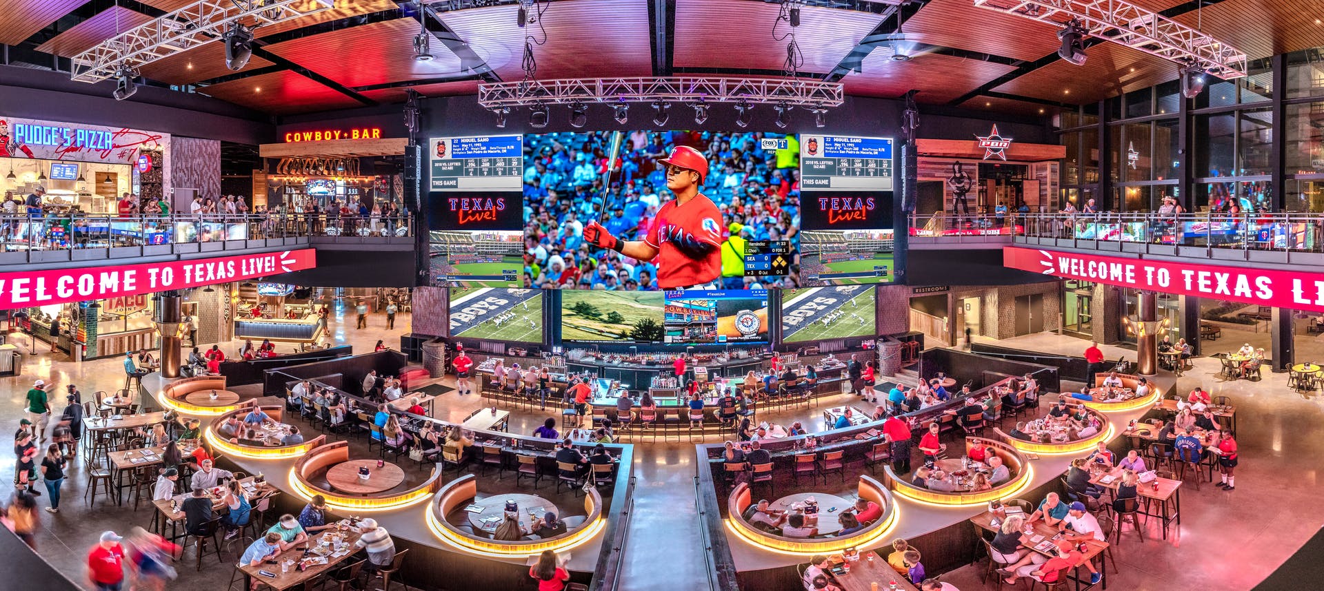 FIG. 1. Four Cordish Companies Live! restaurants have LED-based, direct-view video displays, including this 100-ft diagonal installation in Arlington, TX, that deliver surreal image quality called high dynamic range (HDR) that is due to fast pixel on-off transitions and exceptional contrast ratio. (Photo credit: Image courtesy of The Cordish Companies.)