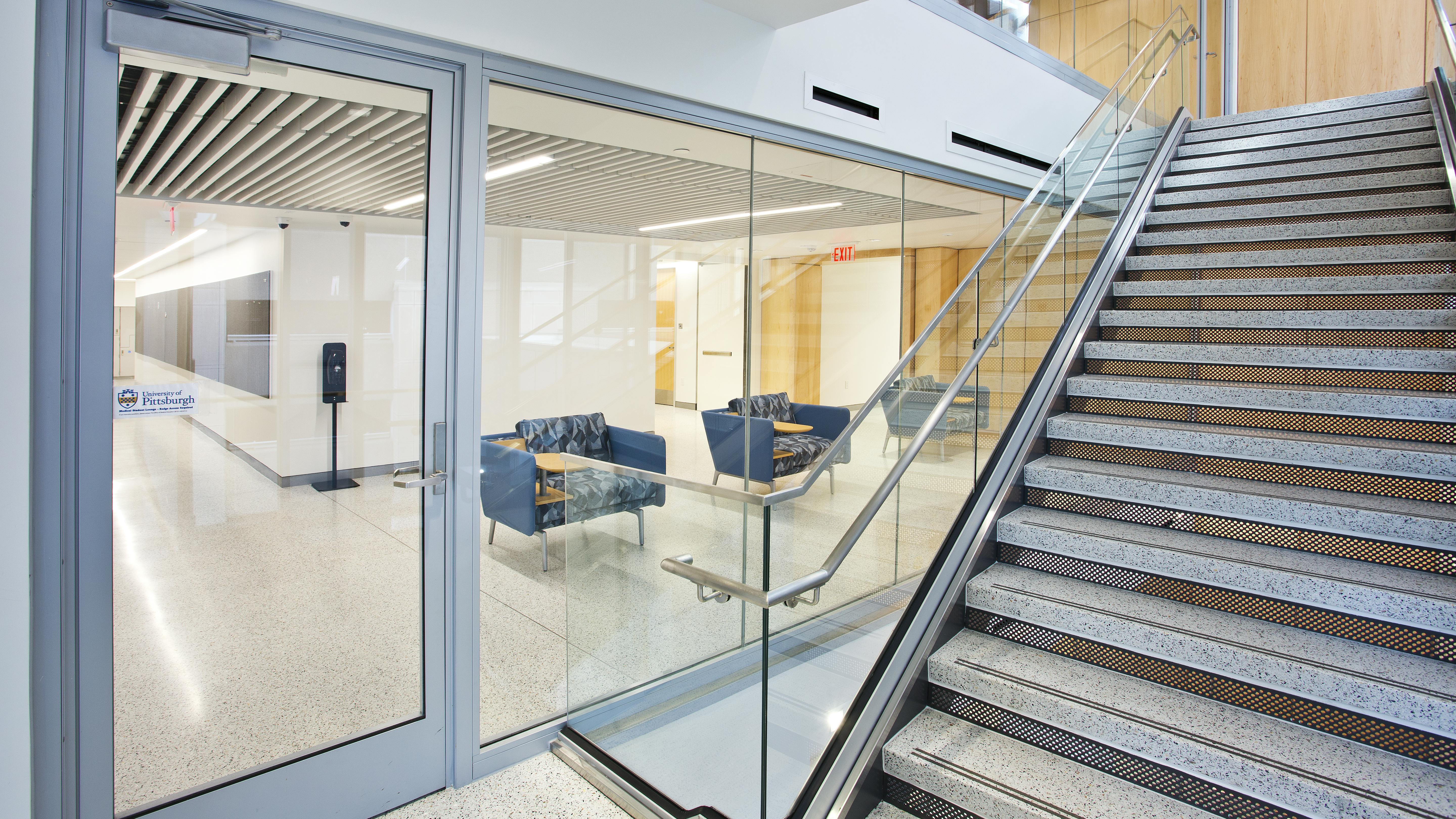 Fire-rated glass supports intuitive wayfinding and open interiors.