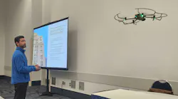Ethan Pisz, chief drone operator for RayAccess, Inc., flies a drone at the 2025 Southern California Facilities Expo.