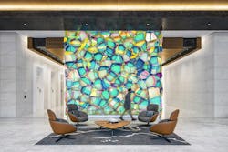 This dichroic glass and LED installation sets the tone for tenant experience, signaling creativity, care, and a commitment to place from the moment visitors walk in. This dichroic glass and LED installation sets the tone for tenant experience, signaling creativity, care, and a commitment to place from the moment visitors walk in.