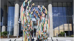 Resembling two hands carved from colored pencils, “Drawn Together” reflects community and connection—core values embedded in the TIAA art experience. Resembling two hands carved from colored pencils, “Drawn Together” reflects community and connection—core values embedded in the TIAA art experience.