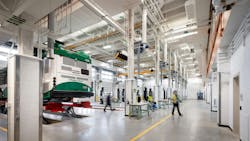 ART bus in a maintenance stall and on a lift. ART bus in a maintenance stall and on a lift.