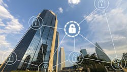 Tall commercial buildings skyline with digital overlay of interconnected pad locks as cybersecurity concept. Tall commercial buildings skyline with digital overlay of interconnected pad locks as cybersecurity concept.