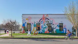 The exterior mural is a vibrant tribute to the building’s location in Charlotte, North Carolina’s NoDa arts district, a neighborhood full of building murals. For Gardner Skelton’s contribution, the mural highlights prominent legal figures, including real (Ruth Bader Ginsburg) and fictional (Jackie Chiles from Seinfeld), and founders Nicole Gardner and Heather Skelton complete with crown as a node to the Queen City.