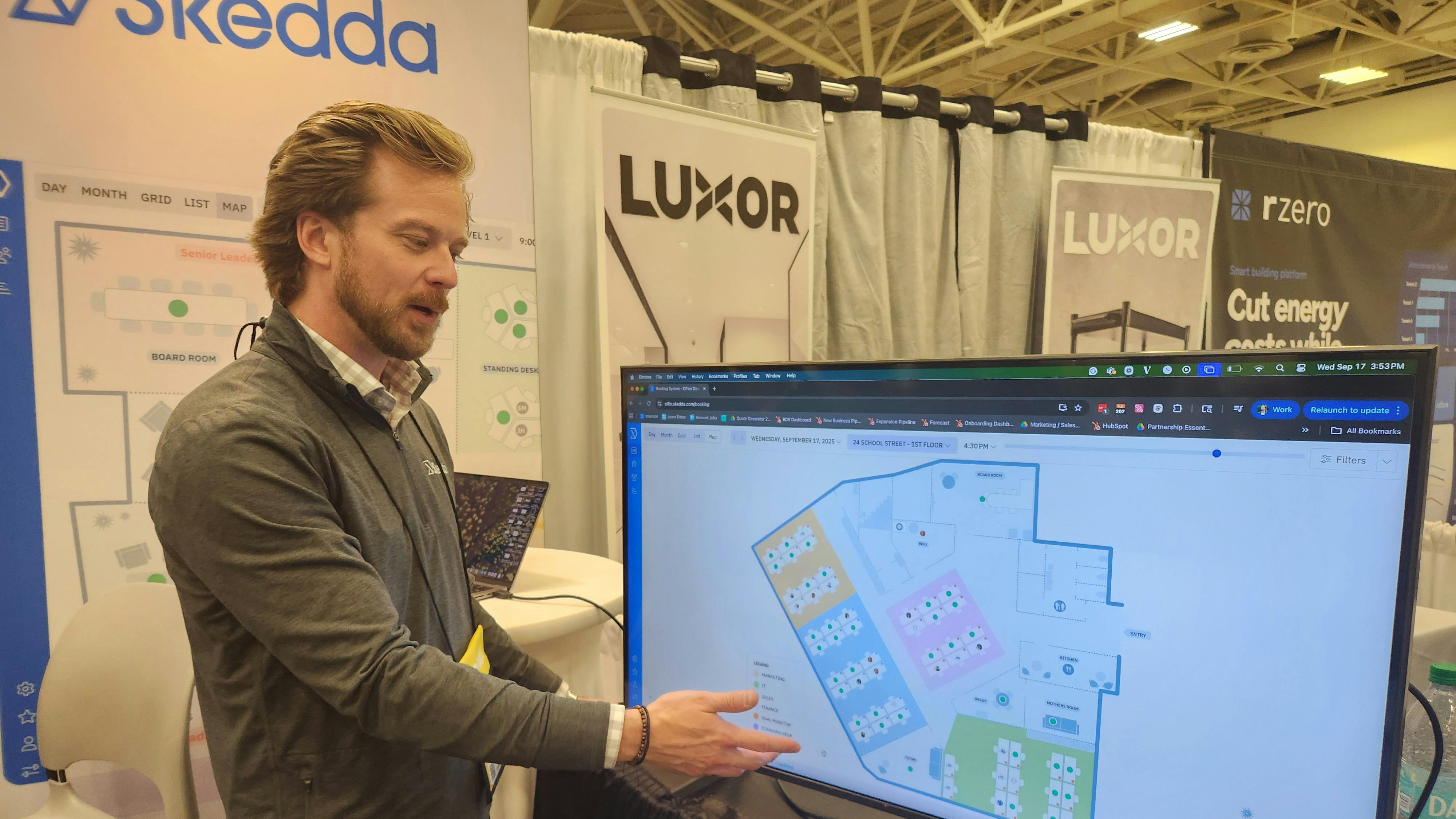 Jake Helman, SVP of sales and partnerships for Skedda, demonstrates how the platform enables easier space booking.