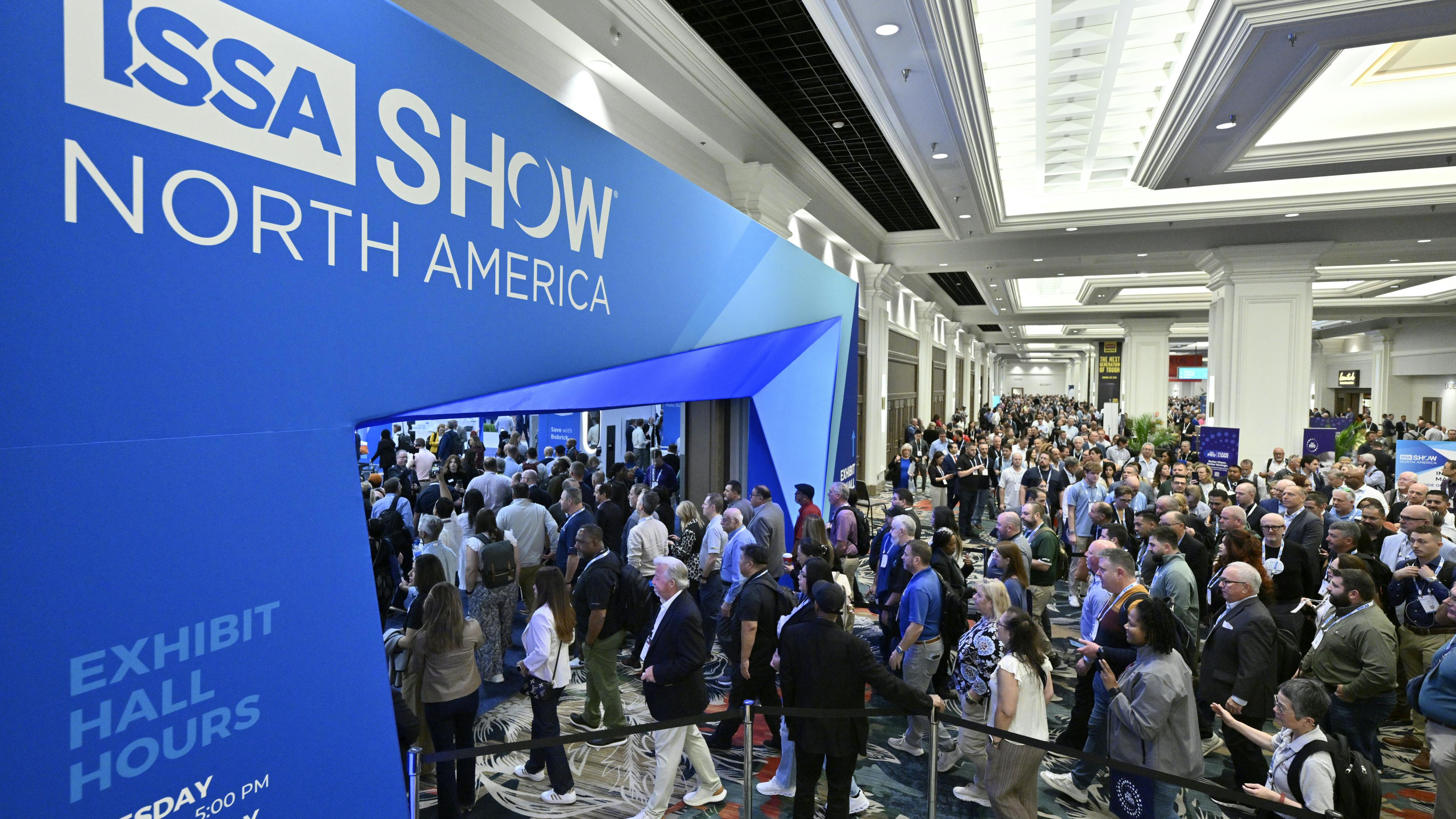People enter the expo floor at the 2025 ISSA Show North America.