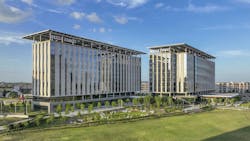 The 22-acre North Texas campus for Wells Fargo features two sleek 10-story office towers and a six-story parking garage. The 22-acre North Texas campus for Wells Fargo features two sleek 10-story office towers and a six-story parking garage.