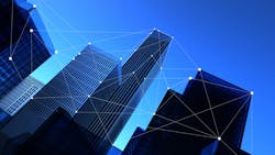 Silhouette of skyscrapers against blue sky with connected data point graphics. Silhouette of skyscrapers against blue sky with connected data point graphics.