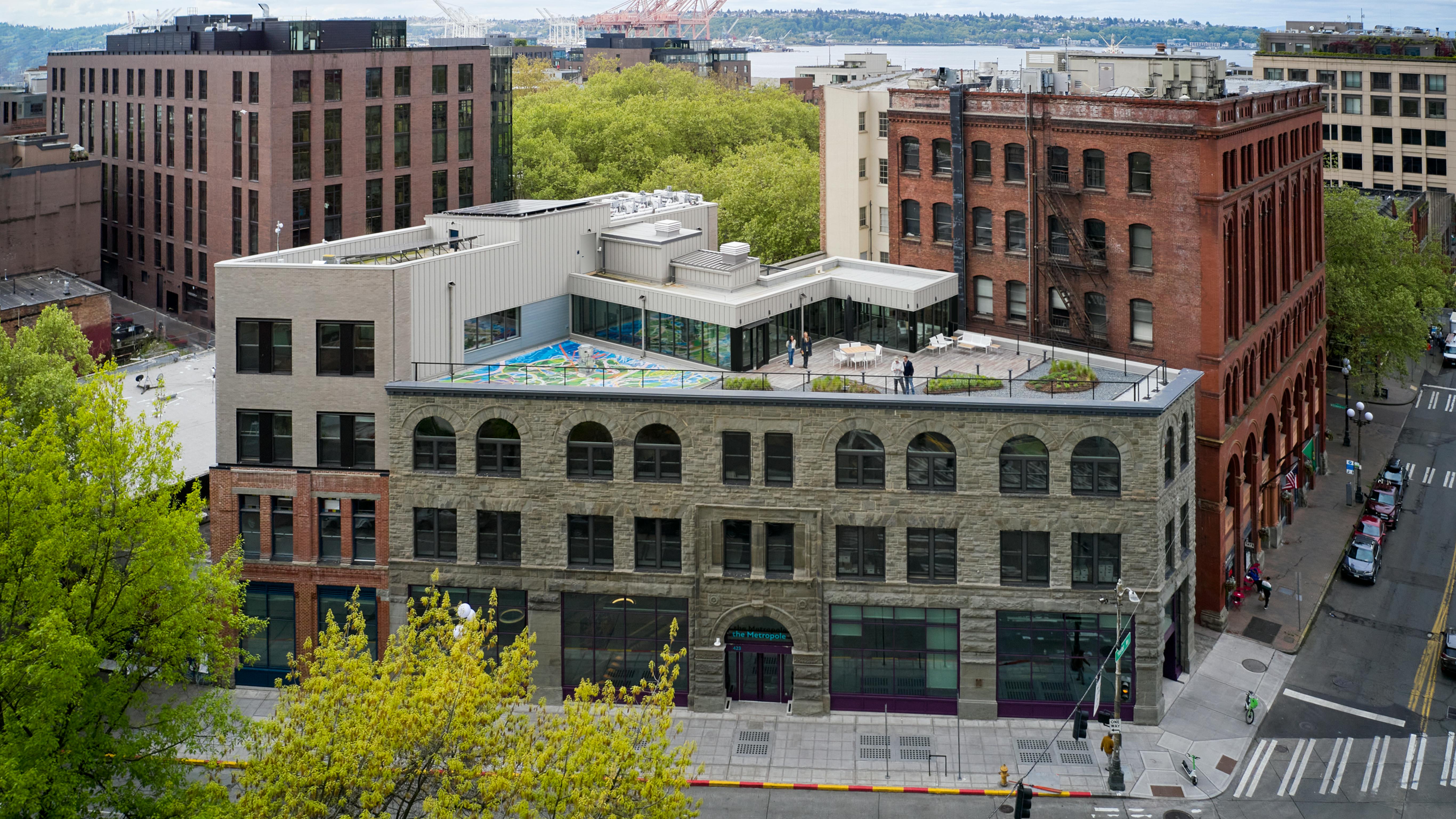 The Metropole&rsquo;s extensive facade renovation included restoring its Richardsonian Romanesque sandstone and rebuilding two stories on the brick portion that were lost in the 1949 earthquake.