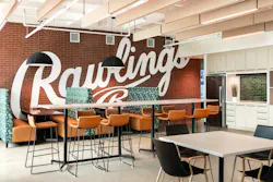 This larger café and break area is a central hub for employees and doubles as a town hall setting for company-wide meetings and events. This larger café and break area is a central hub for employees and doubles as a town hall setting for company-wide meetings and events.