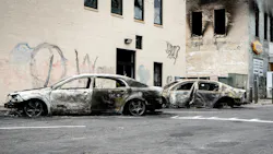 These cars in Minneapolis were damaged during a riot in summer 2020. These cars in Minneapolis were damaged during a riot in summer 2020.