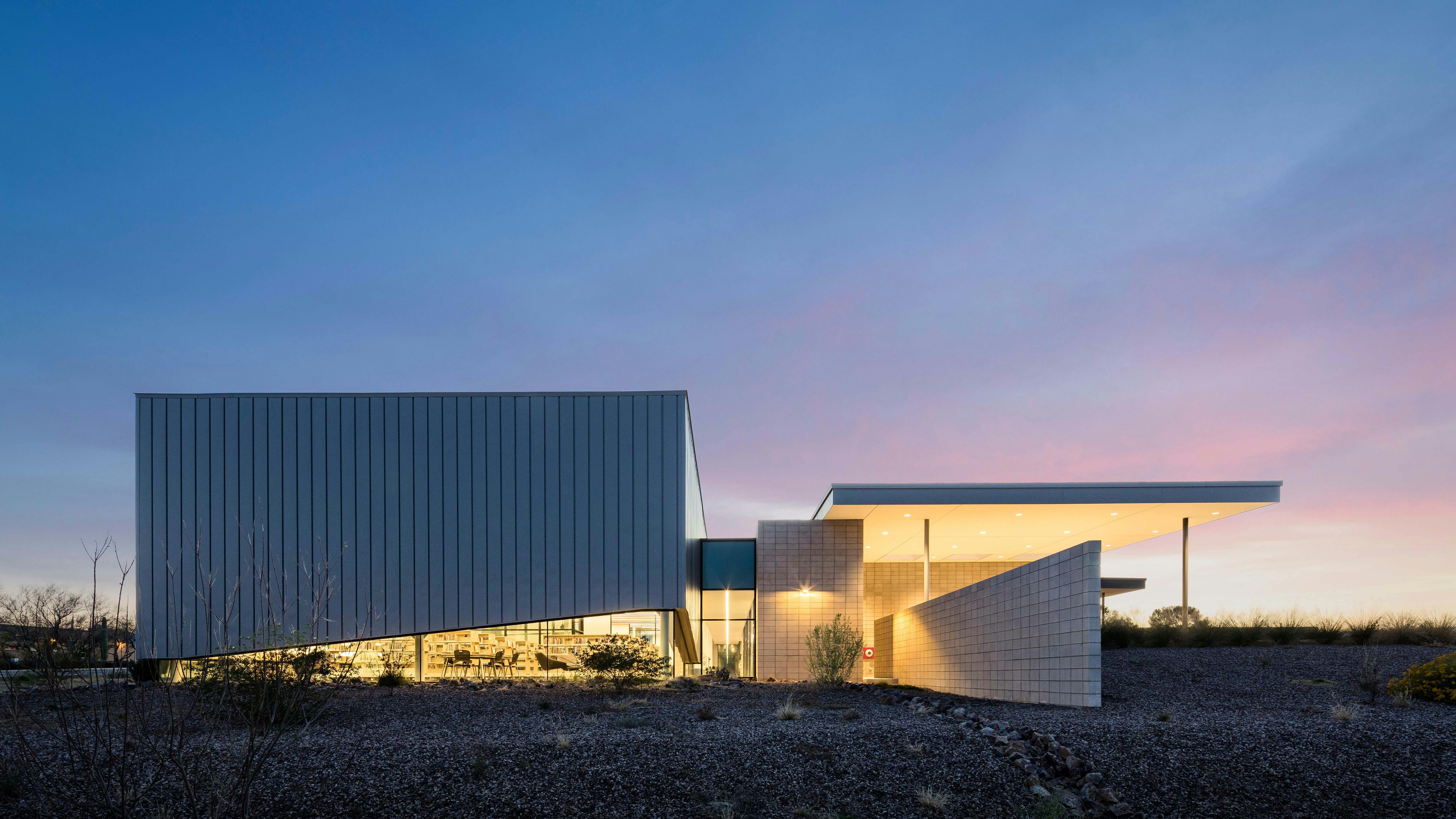The Sahuarita Regional Library in Sahuarita, Arizona, embraces the desert landscape of its location. The building mass and orientation respond to solar exposure, prevailing winds, and pedestrian movement across the site.