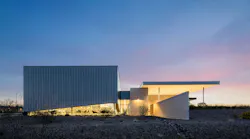 The Sahuarita Regional Library in Sahuarita, Arizona, embraces the desert landscape of its location. The building mass and orientation respond to solar exposure, prevailing winds, and pedestrian movement across the site.