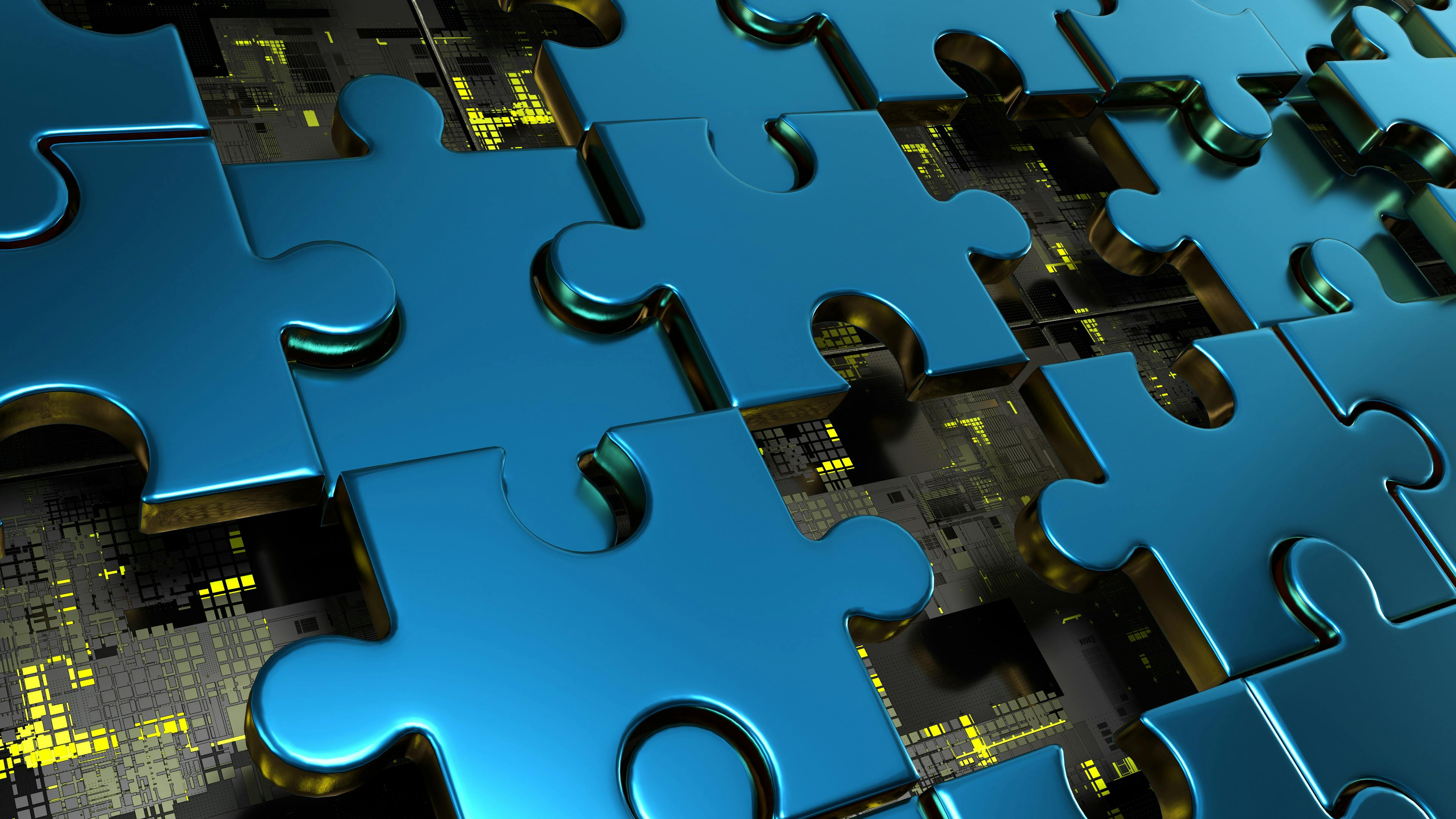 Puzzle pieces with technology circuit board exposed beneath pieces.