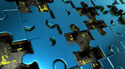 Puzzle pieces with technology circuit board exposed beneath pieces.