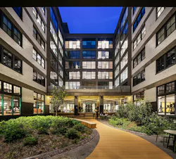 This historic courtyard brings light and gathering space into the heart of the building.
