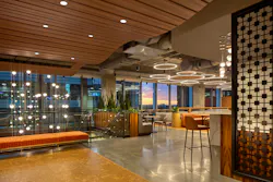 Upgraded common areas and dining options are two ways a repositioning project can enhance occupant satisfaction and comfort. Hendrick Architecture + Design transformed this 40,000-square-foot Atlanta headquarters space for Mag Mutual, creating a hospitality-forward environment that elevates workplace culture.