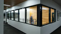 Fire-rated glazing provides transparent protection to safeguard means of egress routes.