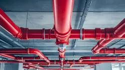 A network of fire sprinkler piping distributes water throughout a building, which makes proper pressure maintenance and routine inspections essential for dependable fire protection.