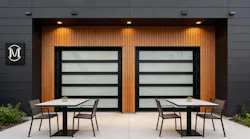 This overhead sectional door features smart glass that can change between opaque (pictured) and transparent.