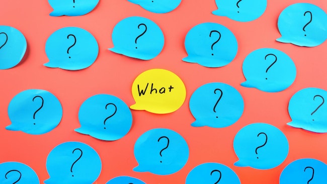 Background of notes with question marks